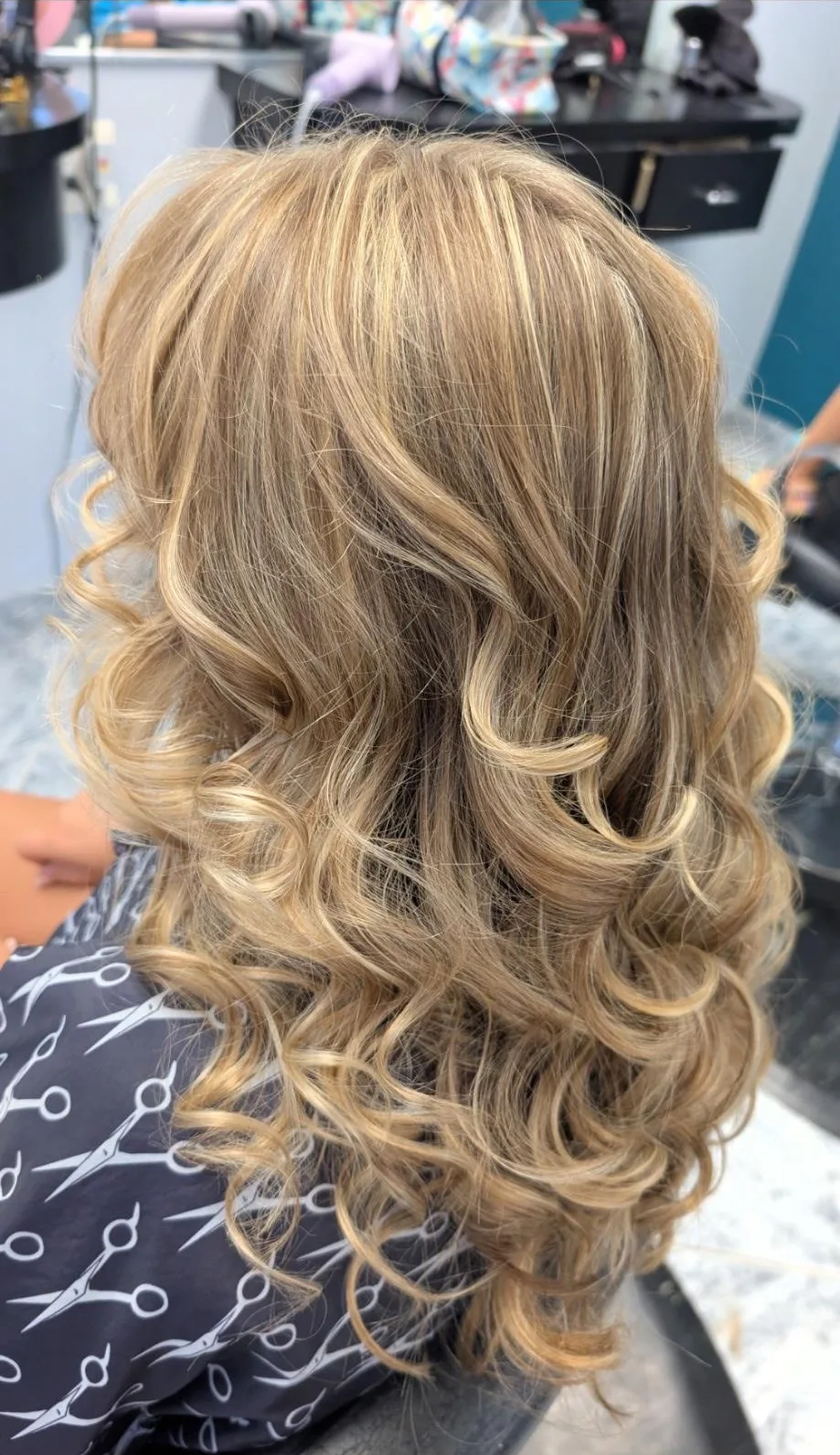 Honey blonde curled layers