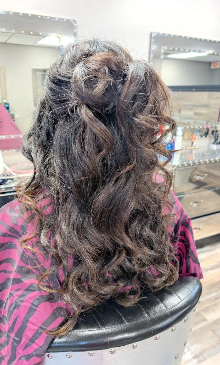 Dark brunette curls, half up